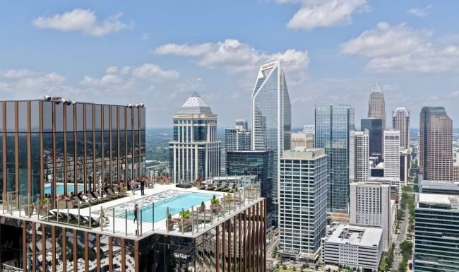 a pool overlooking a city