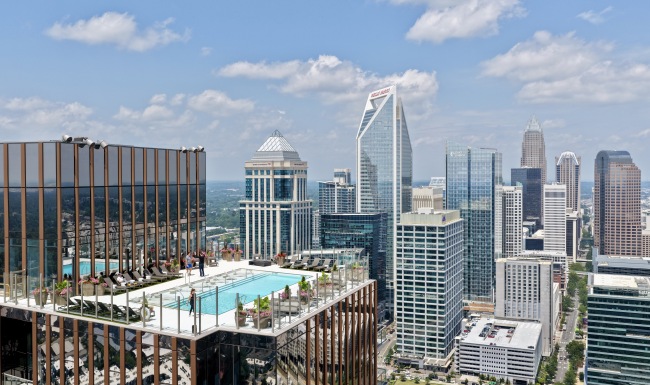 a pool overlooking a city