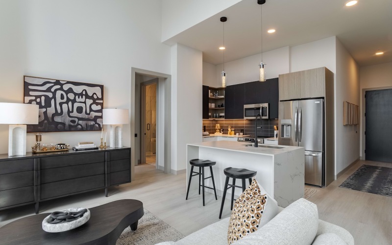 furniture in living room with view of kitchen