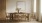 a dining table with chairs around it